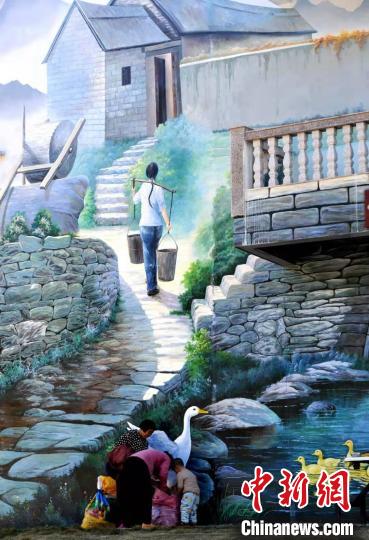 武平县城厢镇尧禄村村民房屋墙上3D彩绘栩栩如生。　张斌 摄