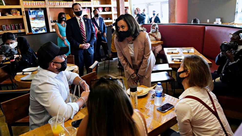 PHOTO: Democratic vice presidential candidate Sen. Kamala Harris meets with people at Amaize restaurant, Sept. 10, 2020, in Doral, Fla.