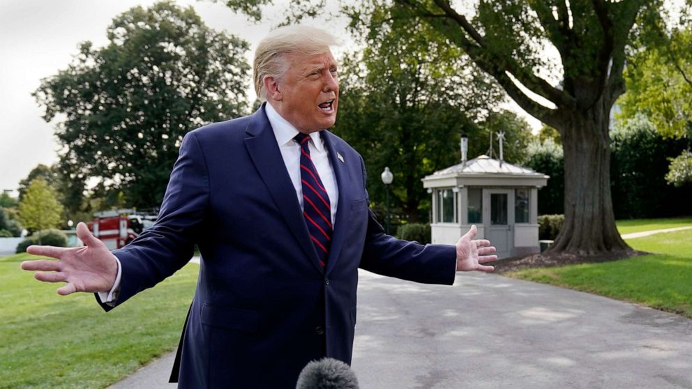 PHOTO: President Donald Trump speaks with reporters as he walks to Marine One on the South Lawn of the White House, Sept. 15, 2020, en route to participate in a town hall event in Philadelphia.