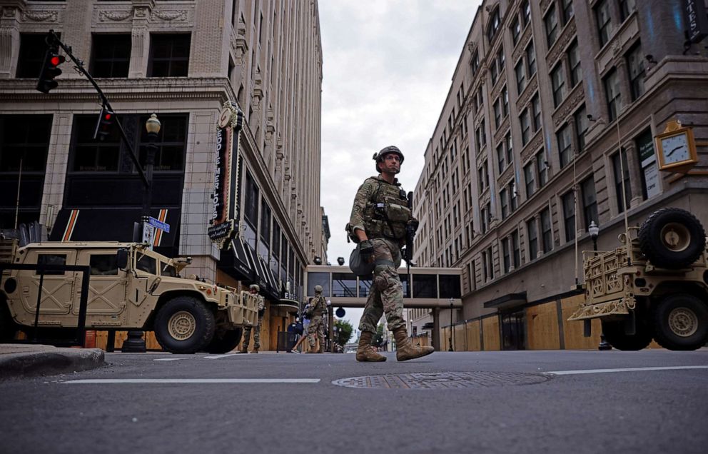 PHOTO: A member of the National Guard patrols the section of a downtown in Louisville, Ky., Sept. 23, 2020.