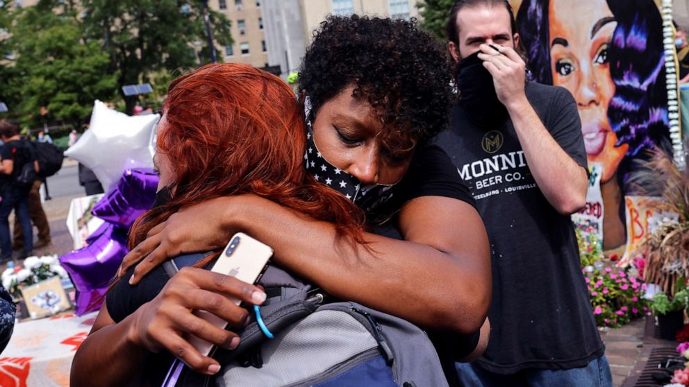 PHOTO: People react after a decision in the criminal case against police officers involved in the death of Breonna Taylor, who was shot dead by police in her apartment, in Louisville, Ky., Sept. 23, 2020.