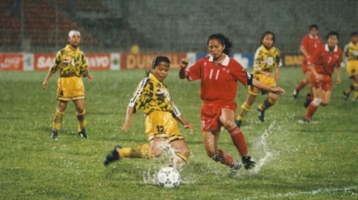 1994年广岛亚运会中国球员在比赛中。图片来源：亚足联网站