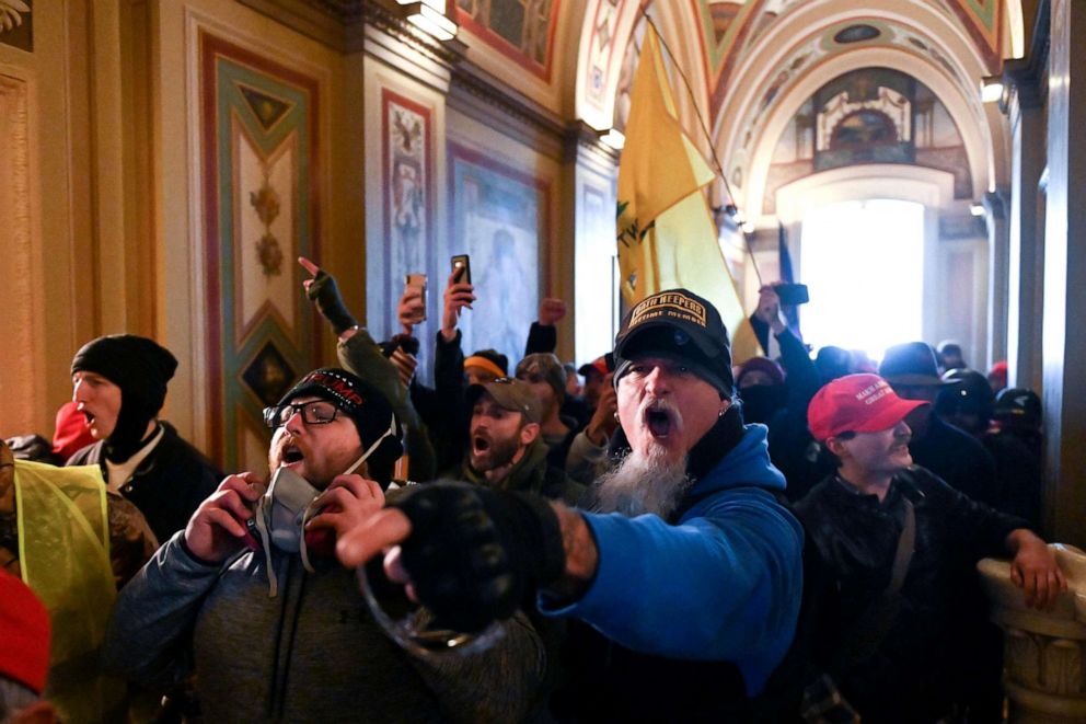 PHOTO: Supporters of US President Donald Trump protest inside the US Capitol on January 6, 2021, in Washington, DC. Demonstrators breeched security and entered the Capitol as Congress debated the a 2020 presidential election Electoral Vote Certification.