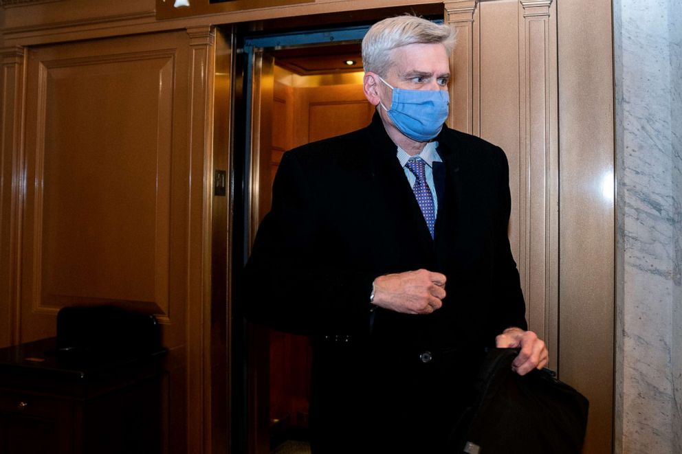 PHOTO: Sen. Bill Cassidy, R-La., wears a protective mask while departing the U.S. Capitol on Feb. 13, 2021 in Washington, D.C.