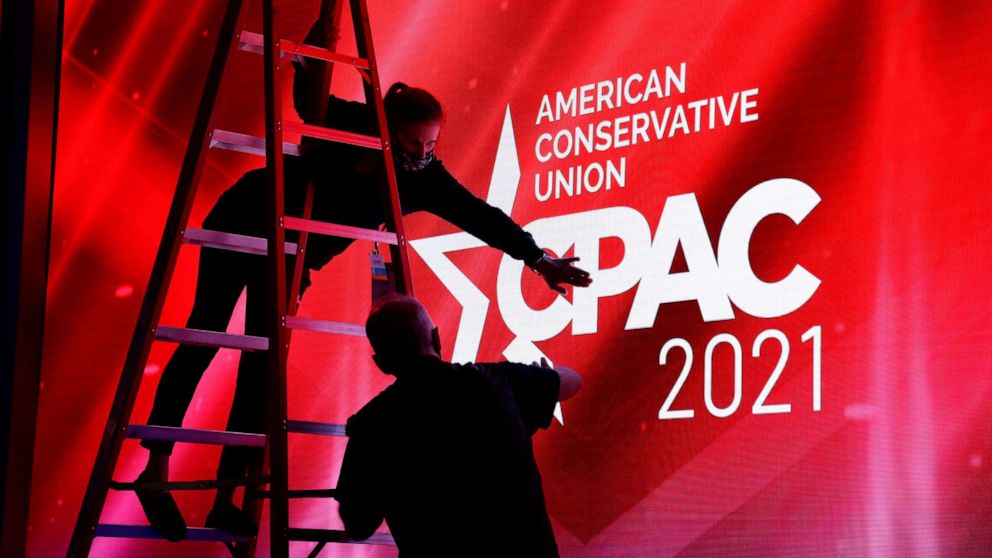 PHOTO: Technicians work on the stage before the start of the Conservative Political Action Conference (CPAC) in Orlando, Florida, on Feb. 25, 2021.