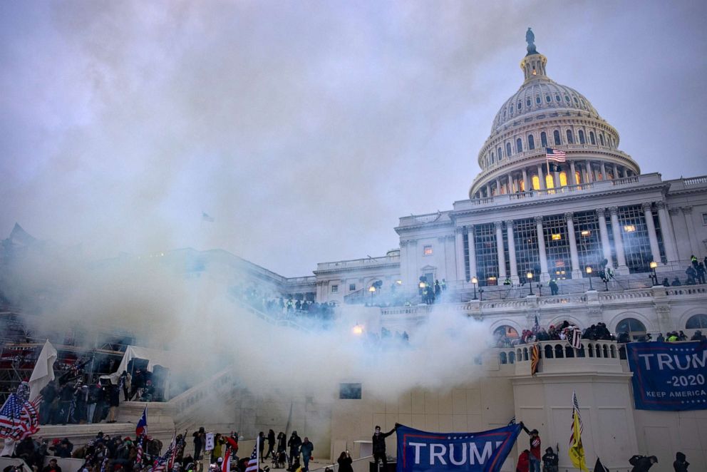 PHOTO: Tear gas is fired at supporters of President Trump who stormed the United States Capitol building, Jan. 6, 2021.