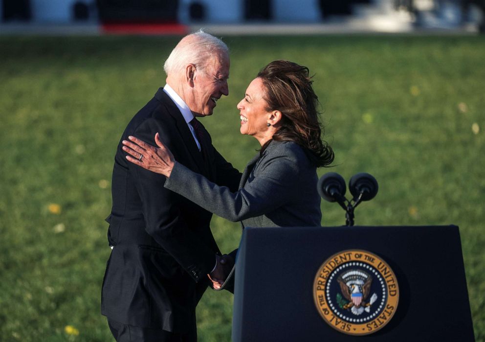 PHOTO: President Joe Biden shakes hands with  Vice President Kamala Harris at the ceremonial signing of the 