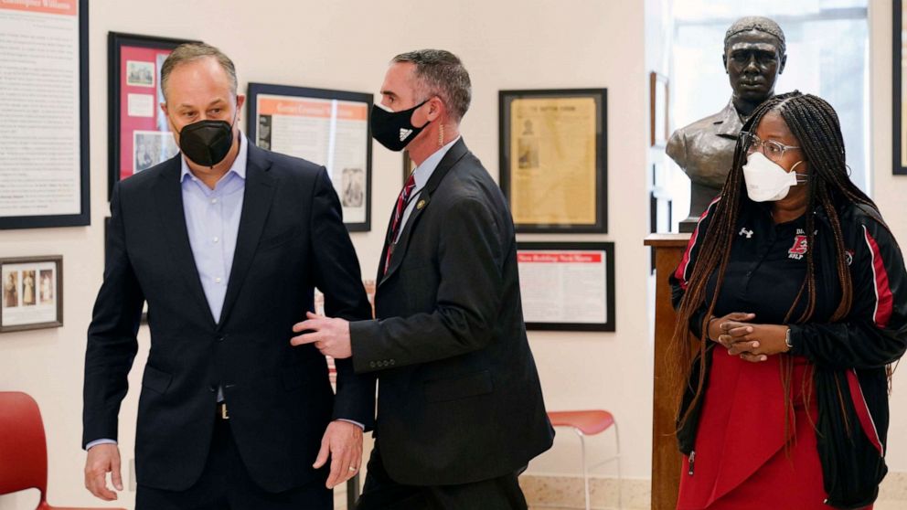 PHOTO: Doug Emhoff, the husband of Vice President Kamala Harris, is whisked out of an event at a high school by a Secret Service agent following an apparent security concern, Feb. 8, 2022 in Washington.