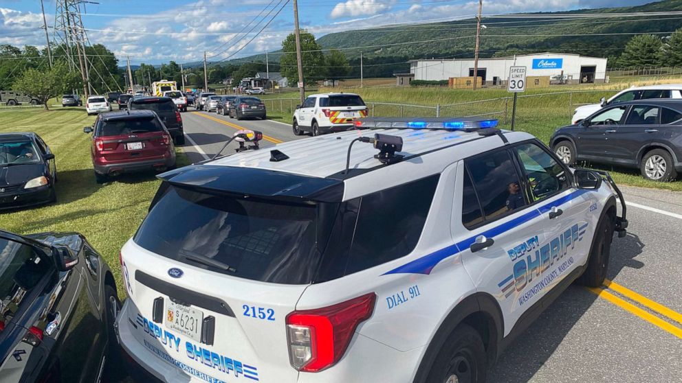 PHOTO: Law enforcement stages near the scene of a shooting at Columbia Machine, Inc., in Smithsburg, Md., June 9, 2022.