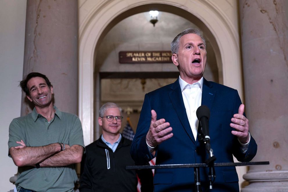 PHOTO: Speaker of the House Kevin McCarthy is joined by his top negotiators on the debt limit, Rep. Garret Graves, left, and Rep. Patrick McHenry, as he talks to reporters at the Capitol in Washington, D.C., on May 28, 2023.