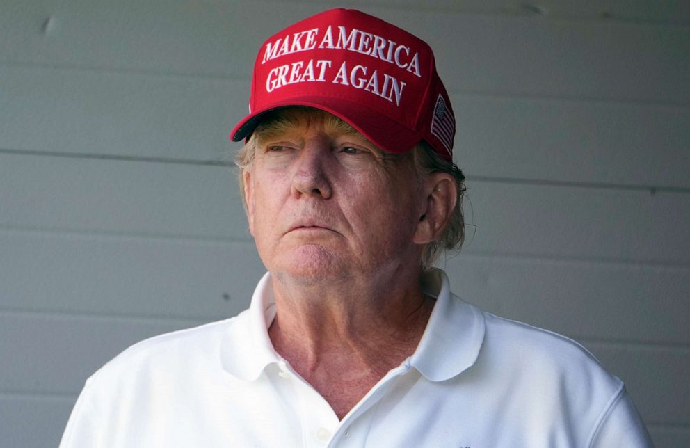 PHOTO: Former President Donald Trump watches the first round of the LIV Golf Tournament at Trump National Golf Club, May 26, 2023, in Sterling, Va.