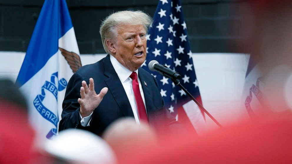 PHOTO: Former President Donald Trump visits with campaign volunteers at the Grimes Community Complex Park, June 1, 2023, in Des Moines, Iowa.